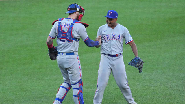 Texas Rangers closer Jose Leclerc, right, celebrates with catcher Jonah Heim after defeating the Baltimore Orioles in Saturday in Game 1 of the ALDS at Oriole Park at Camden Yards.